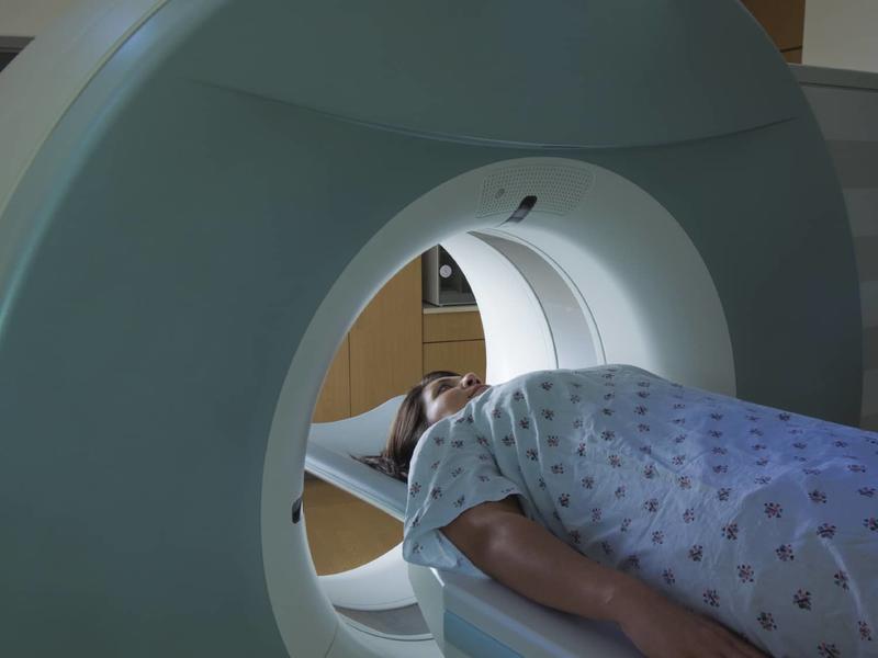 person going inside ct imaging machine
