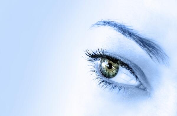 image of a female eye with long eyelashes
