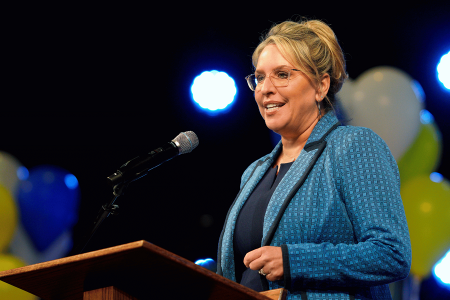 An image of Heidi Edwards speaking at the graduation