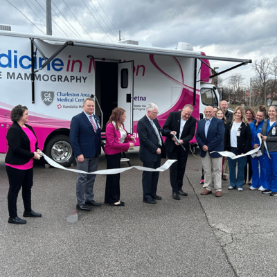 Members of leadership cutting the ribbon for the new units.